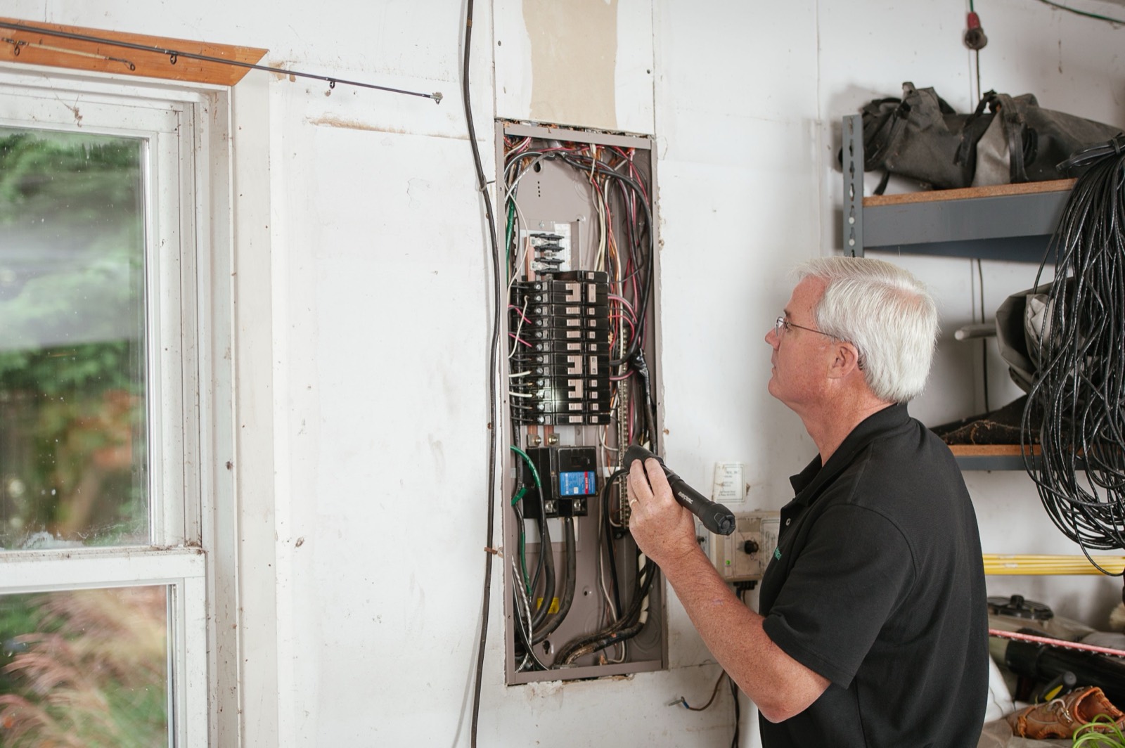 Industrial electrician working on wiring